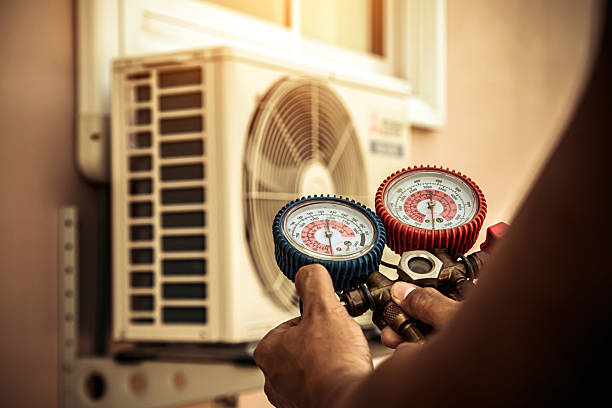 Professional Air Conditioning Service technician working in Hagaman, NY